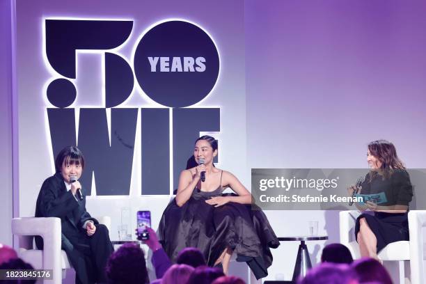 Celine Song, Greta Lee and moderator Janice Min speak onstage at the WIF Honors Celebrating 50 Years Presented by Max Mara with sponsor ShivHans...