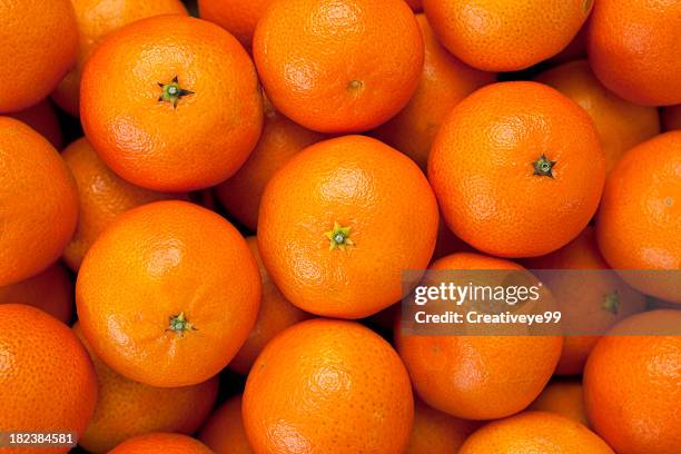 tangerine background - tangerine stock pictures, royalty-free photos & images