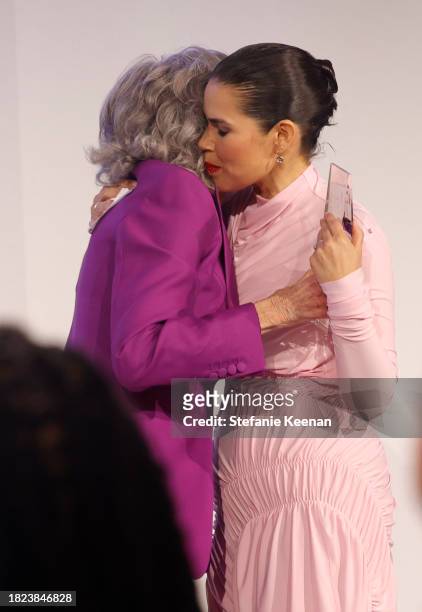 Jane Fonda and America Ferrera embrace onstage at the WIF Honors Celebrating 50 Years Presented by Max Mara with sponsor ShivHans Pictures, Amazon...