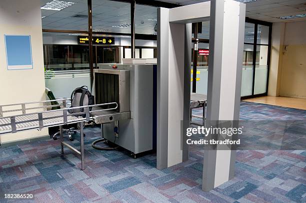 luggage and body scanner in an airport security check point - security scanner stock pictures, royalty-free photos & images