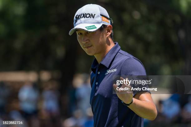 Rikuya Hoshino of Japan gestures to the crowd on the 3rd green during the ISPS HANDA Australian Open at The Australian Golf Course on December 01,...