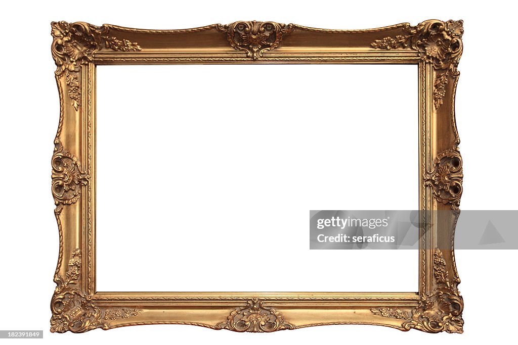 Empty gold ornate picture frame with white background