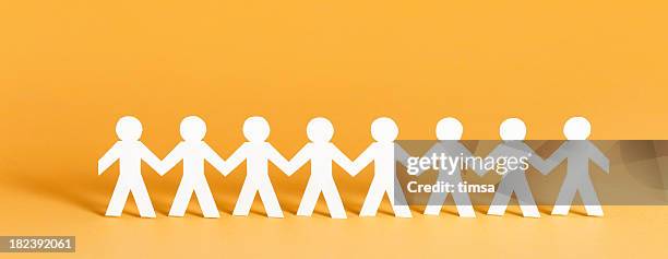 community concept - human chain stock pictures, royalty-free photos & images