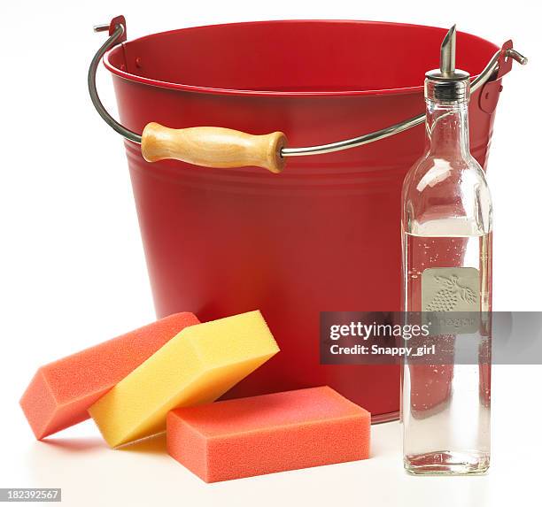 cleaning supplies with a red bucket, sponges, and a bottle - emmer stockfoto's en -beelden
