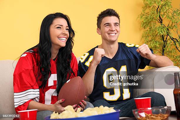 football fans at home - table fan stock pictures, royalty-free photos & images