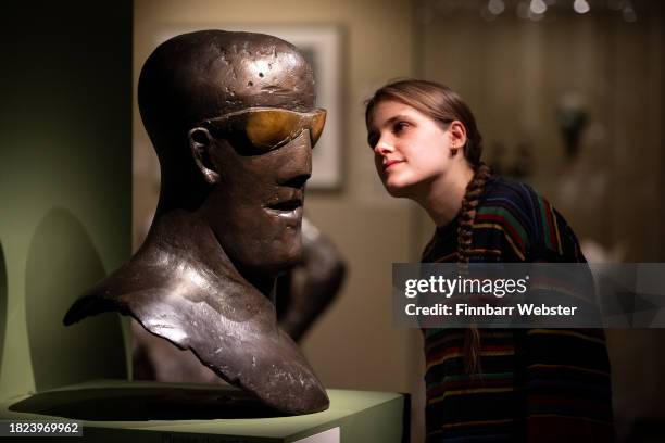 Eve Mordue, Collections Manager at Dorset Museum, poses with 'Goggle Head', courtesy of The Ingram Collection of Modern British Art, at the Elisabeth...
