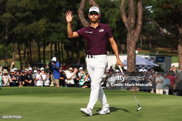 Min Woo Lee of Australia celebrates making a Birdie on the 18th hole during the ISPS HANDA Australian Open at The Australian Golf Course on December...