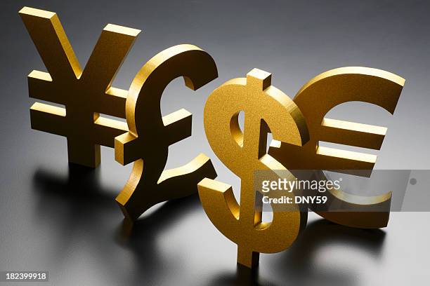 collection of different currency symbols on gray background - yen sign stock pictures, royalty-free photos & images