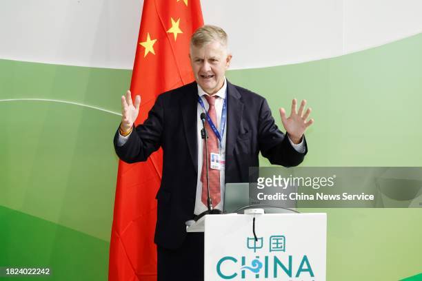 Erik Solheim, former Under-Secretary-General of the United Nations, speaks at the launch ceremony of China Pavilion during the 28th session of the...