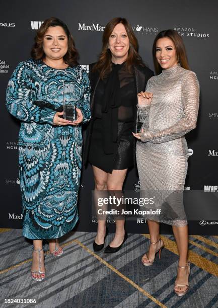 Kirsten Schaffer, Chief Executive Officer of WIF with winners of the Crystal Award for Advocacy Linda Yvette Chávez and Eva Longoria, wearing...