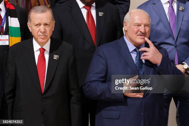 Turkish President Recep Tayyip Erdogan and Belarusian President Aleksandr Lukashenko prepare for a family photo during day one of the high-level...