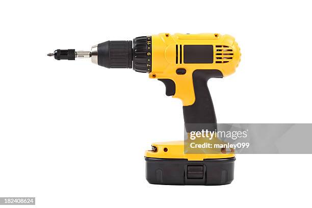 isolated power tool in yellow - elektrisch gereedschap stockfoto's en -beelden