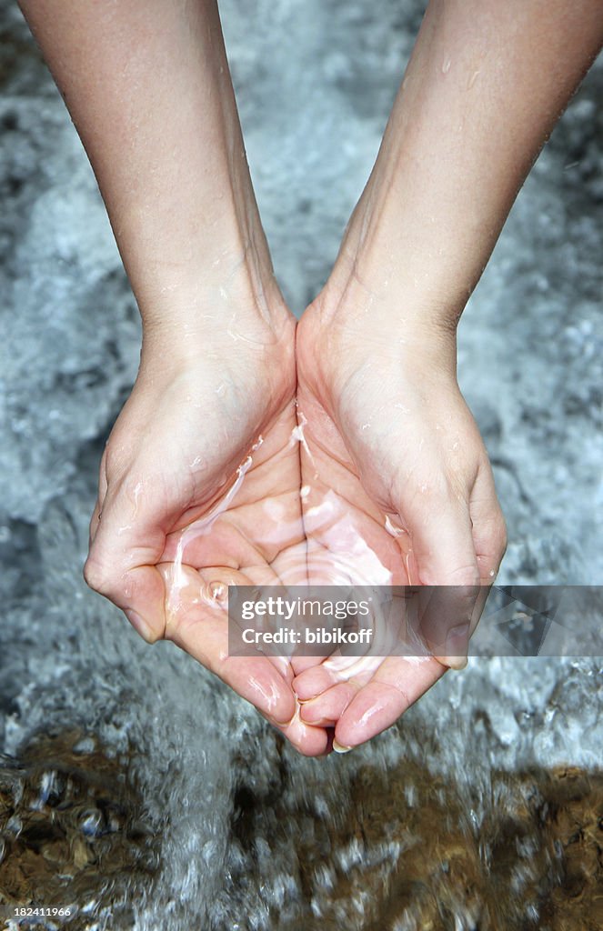 Hands with pure water