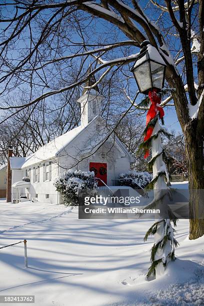 snowy country church at christmas time - country christmas stock pictures, royalty-free photos & images