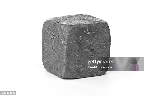 lead metal cube isolated on white - lead stockfoto's en -beelden