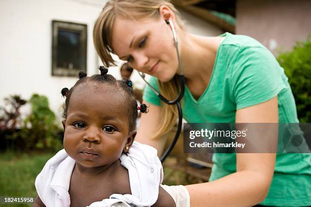 health worker - orphanage stock pictures, royalty-free photos & images