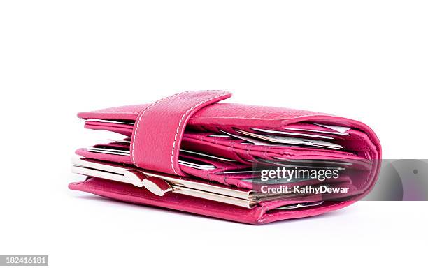 women stuffed pink wallet - portefeuille stockfoto's en -beelden