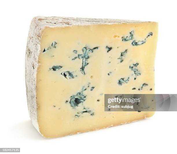 close-up of a slice of blue cheese on a white background - roquefort stock pictures, royalty-free photos & images
