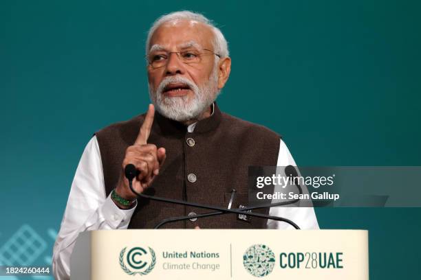 Indian Prime Minister Narendra Modi speaks during day one of the high-level segment of the UNFCCC COP28 Climate Conference at Expo City Dubai on...