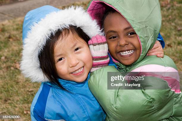 bundled up fun - preschool student stock pictures, royalty-free photos & images
