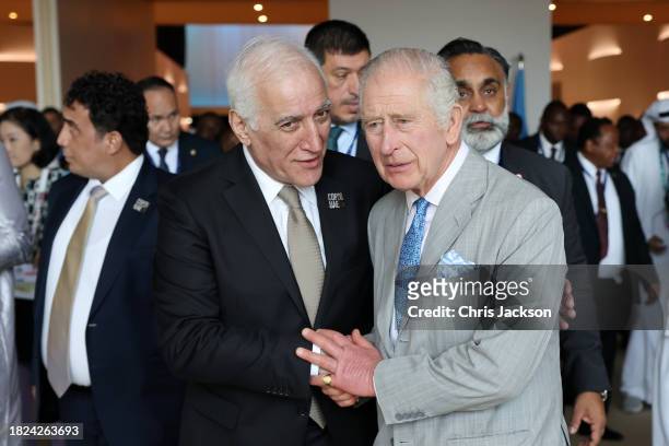 President of Armenia Vahagn Khachaturyan greets King Charles III as they attend the opening ceremony of the World Climate Action Summit during COP28...