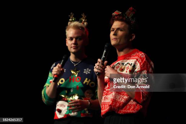 Joel Creasey and Rhys Nicholson perform on stage during "Rhys & Joel's Family Christmas" at Enmore Theatre on December 01, 2023 in Sydney, Australia.