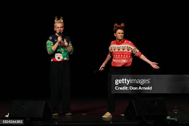 Joel Creasey and Rhys Nicholson perform on stage during "Rhys & Joel's Family Christmas" at Enmore Theatre on December 01, 2023 in Sydney, Australia.