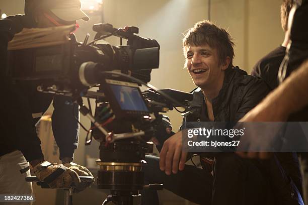 riding the dolly - film director stock pictures, royalty-free photos & images