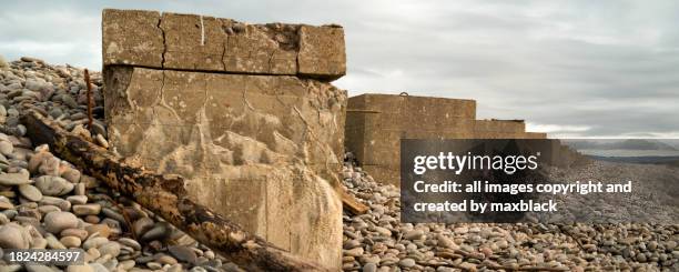 concrete anti tank blocks-kingston on spey, scotland. - pebble shapes stock pictures, royalty-free photos & images