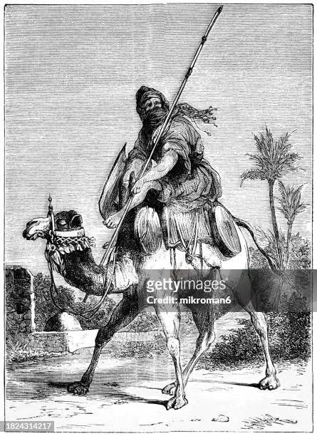 old engraving illustration of the tuareg man (twareg or touareg) a large berber ethnic group that principally inhabit the sahara in a vast area stretching from far southwestern libya to southern algeria, niger, mali, and burkina faso - tuareg stock pictures, royalty-free photos & images