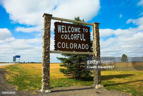 welcome sign for colorful colorado on a grassy field - colorado springs stock pictures, royalty-free photos & images