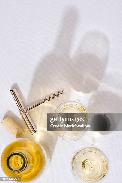 wine concept - white wine bottle tablecloth stock pictures, royalty-free photos & images