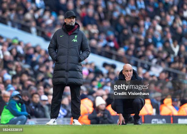 Liverpool manager Jurgen Klopp and Manchester City manager Pep Guardiola during the Premier League match between Manchester City and Liverpool FC at...