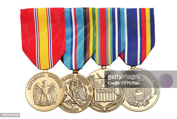 4 military medals hanging on colorful ribbons - medal stock pictures, royalty-free photos & images