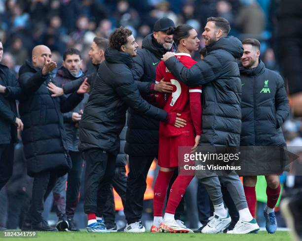 Darwin Nunez of Liverpool and Manchester City manager Pep Guardiola clash after the Premier League match between Manchester City and Liverpool FC at...