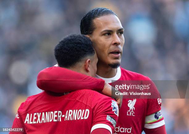 Virgil van Dijk of Liverpool and Trent Alexander-Arnold celebrate during the Premier League match between Manchester City and Liverpool FC at Etihad...