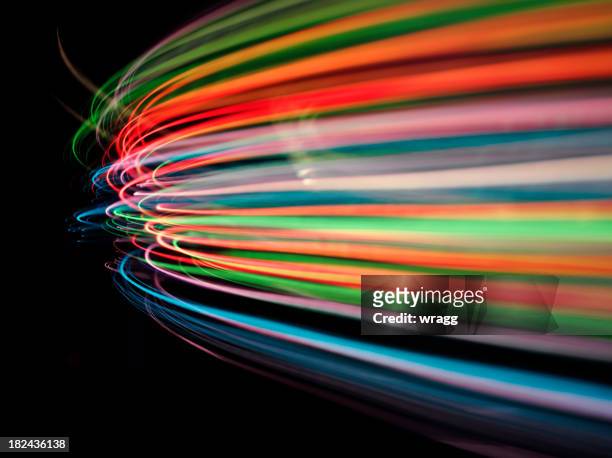speed of coloured lights - fiber optic stock pictures, royalty-free photos & images