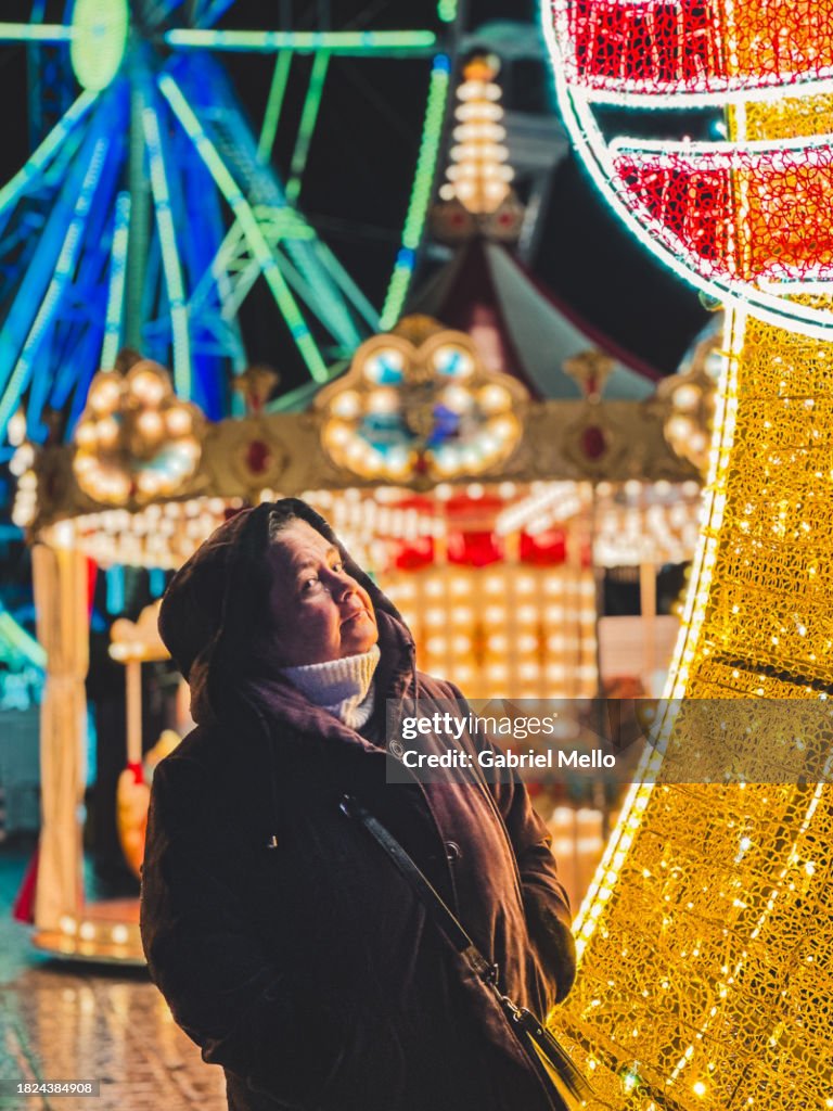 Senior woman at Christmas market