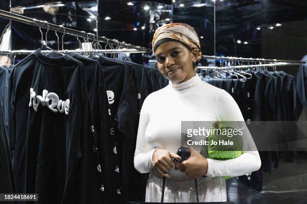 Joyce Michaline poses with Beyonce Sweat Shirts at the Beyoncé Exclusive Renaissance Flagship Store on December 1, 2023 in London, England.
