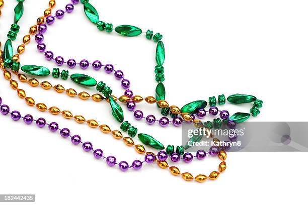 set of colorful beads over a white background - bead stockfoto's en -beelden