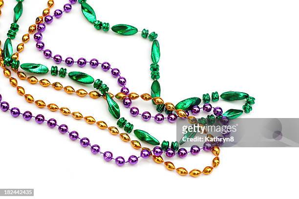 set of colorful beads over a white background - mardi gras party 個照片及圖片檔