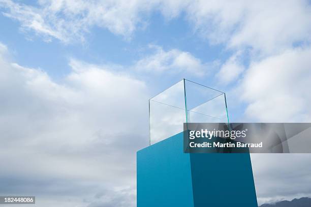 water in a blue receptacle box outdoors - glass box stock pictures, royalty-free photos & images