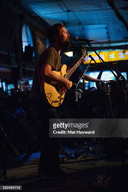 Singer and guitarist Matt Pelham of the Features performs during an EndSession hosted by 107.7 The End at the J&M Cafe on September 29, 2013 in...