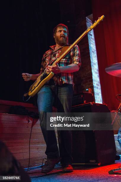 Bassist Roger Dabbs of the Features performs during an EndSession hosted by 107.7 The End at the J&M Cafe on September 29, 2013 in Seattle,...