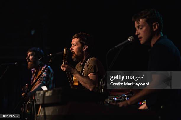 Bass player Roger Dabbs , singer/guitarist Matt Pelham and keyboard player Mark Bond of the Features perform during an EndSession hosted by 107.7 The...