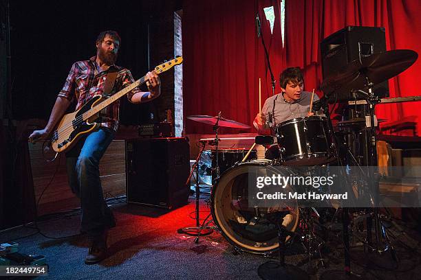 Bass player Roger Dabbs and drummer Rollum Haas of the Features perform during an EndSession hosted by 107.7 The End at the J&M Cafe on September 29,...