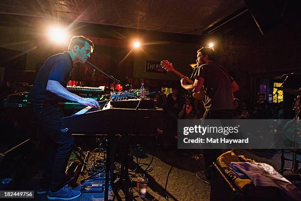 Keyboard player Mark Bond and singer/guitarist Matt Pelham of the Features perform during an EndSession hosted by 107.7 The End at the J&M Cafe on...