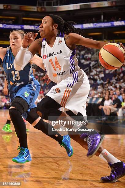 Alexis Hornbuckle of the Phoenix Mercury drives against Lindsay Whalen of the Minnesota Lynx in Game 2 of the Western Conference Finals during 2013...