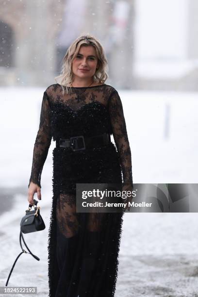 Anna Stukkert seen wearing Lemonade Munich jewelry / black necklace, MATSOUR’I black laced long dress with full length sleeves, Dolche Gabbana black...