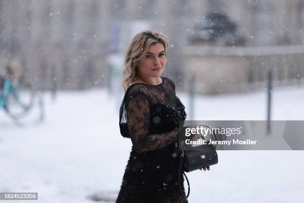 Anna Stukkert seen wearing Lemonade Munich jewelry / black necklace, MATSOUR’I black laced long dress with full length sleeves, Dolche Gabbana black...